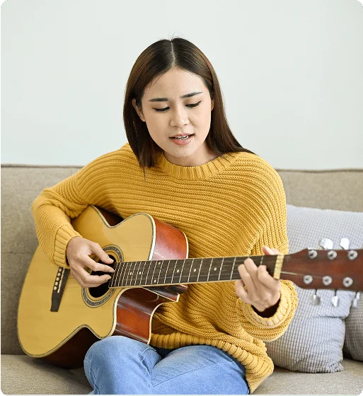 Guitar instructor playing guitar